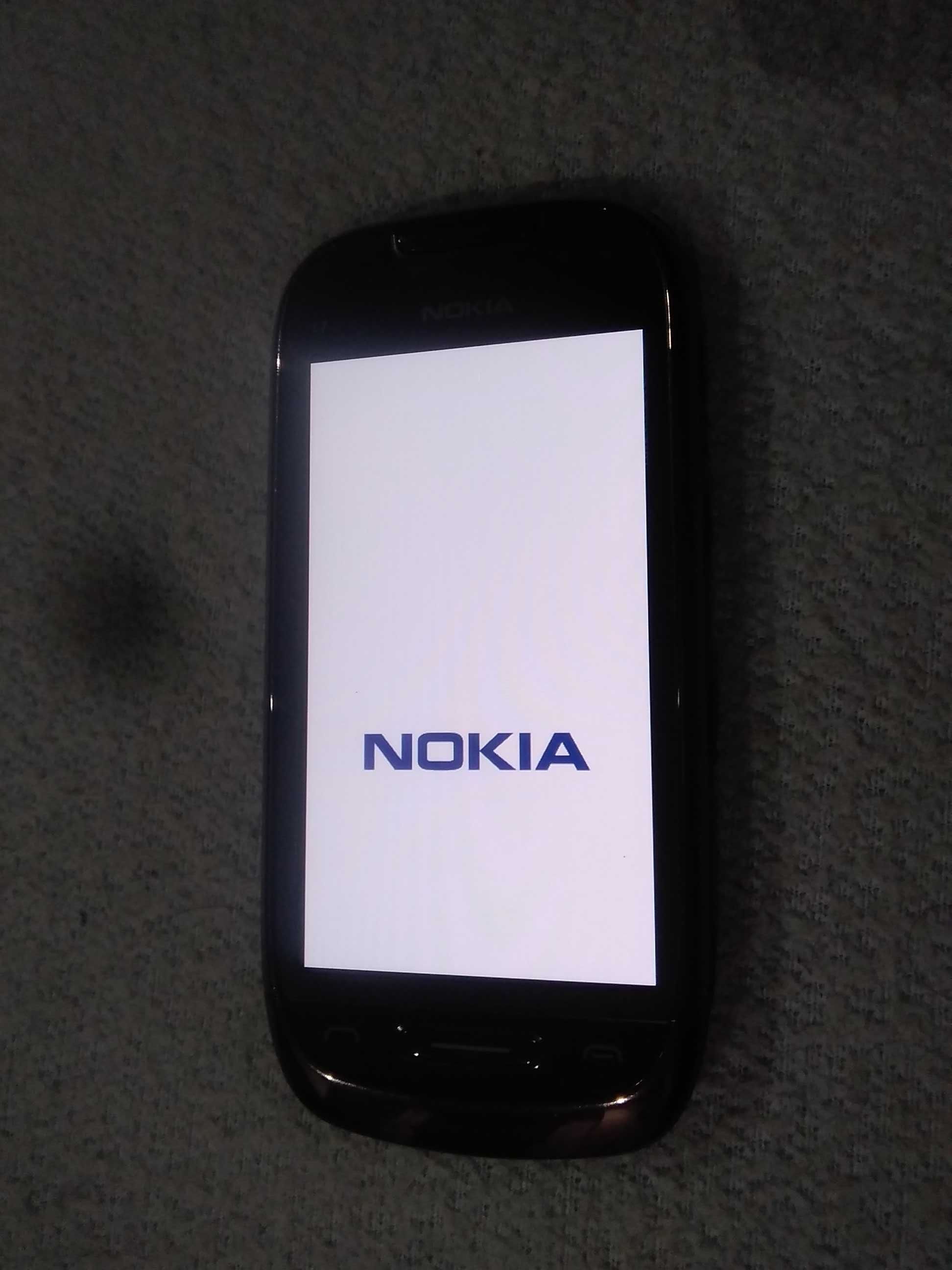 Telefon smartfon NOKIA C7-00 jak nowa stan idealny z ładowarką