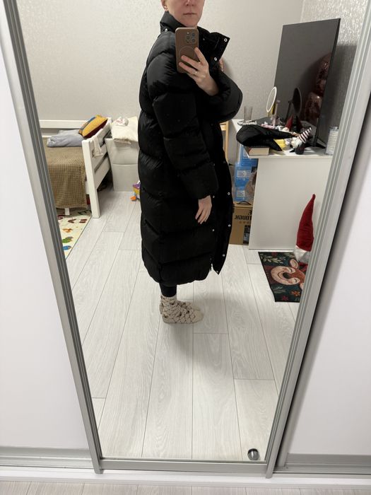 Продам пуховик чорний довгий