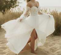 Suknia ślubna z rękawkami