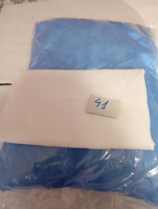 Подушка и простирадло нові