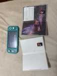 nintendo switch lite + 2 jogos