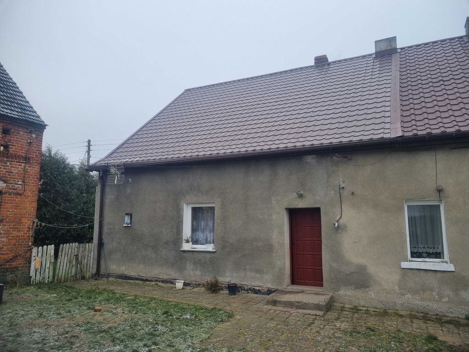 Sprzedam mieszkanie w domu w zabudowie bliźniaczej z dwiema działkami.