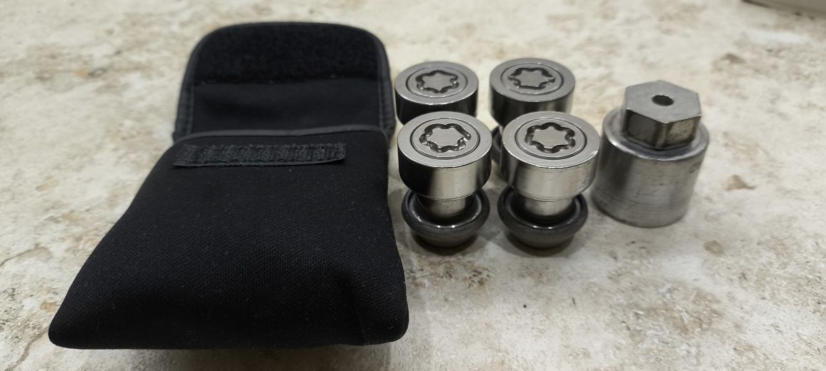 Nakrętki M14 zabezpieczające do alufelg S-max Galaxy komplet FORD