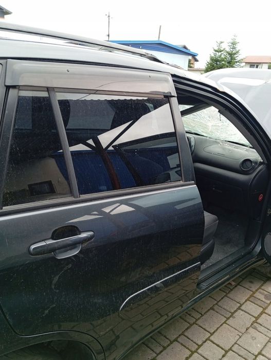 TOYOTA RAV4 II LIFT 5D DRZWI PRAWY TYŁ TYLNE GOŁE 1E0