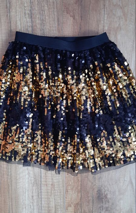 Spódniczka elegancka z złotymi cekinami 140 rozmiar
