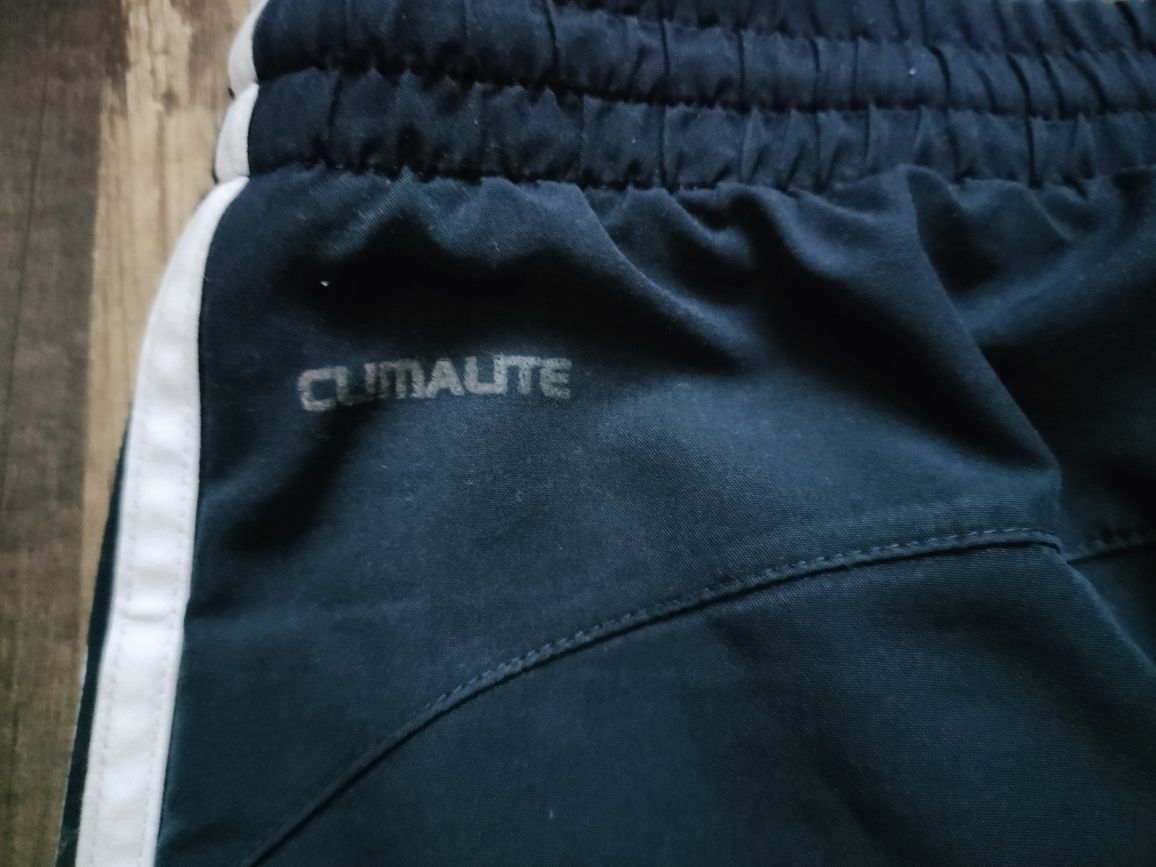 dresowe spodnie Adidas Climalite z podszewką i zamkami