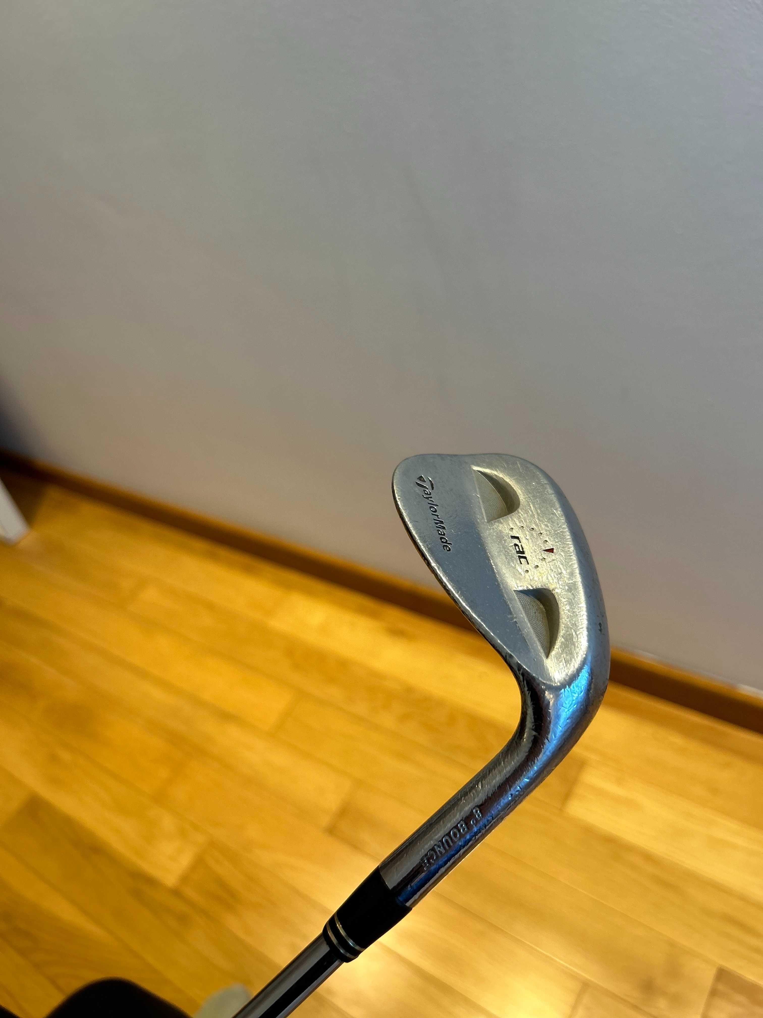 Golf Club: Taylormade 52 degree ledge. Regular shaft. Golf pride grip.