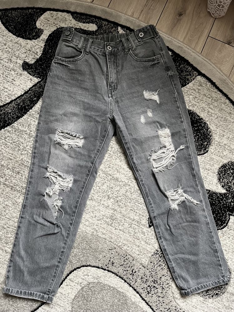Spodnie jeans   rozdarte damski rozmiar 40