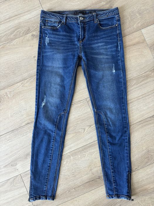 Niebieskie jeansy Reserved typu slim / skinny