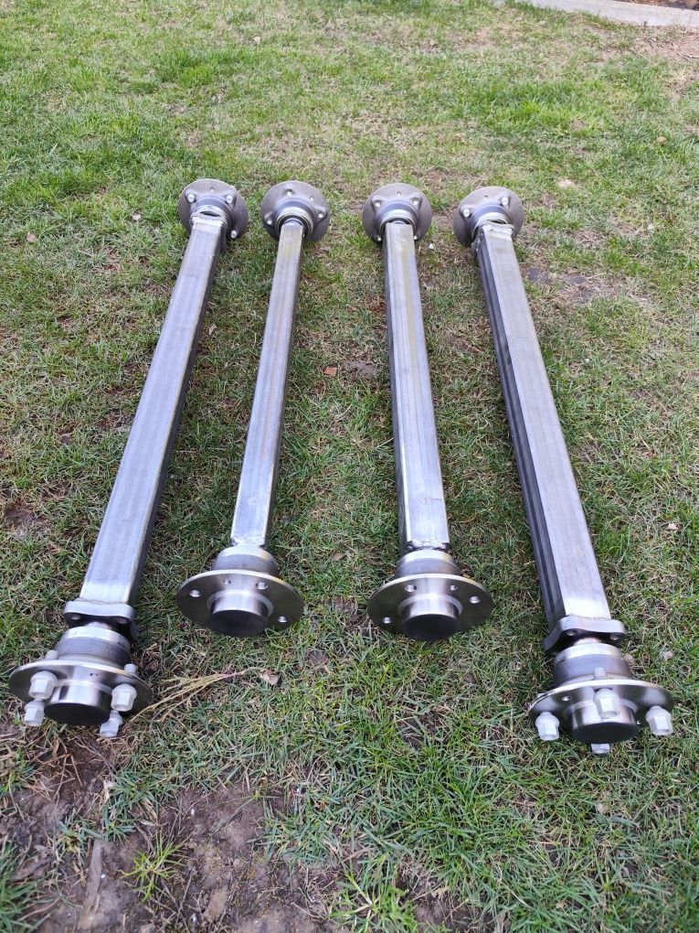 Nowa oś z piastami 4x110  pod wózek