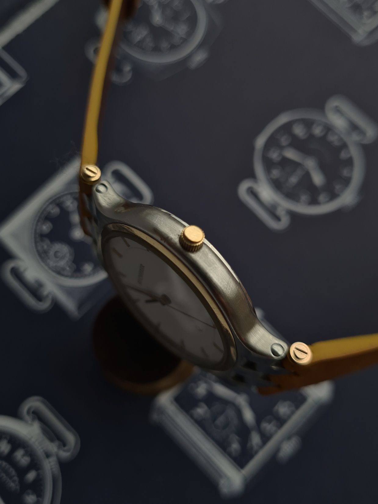 Bucherer zegarek szwajcarski swiss made kwarcowy stal zloto