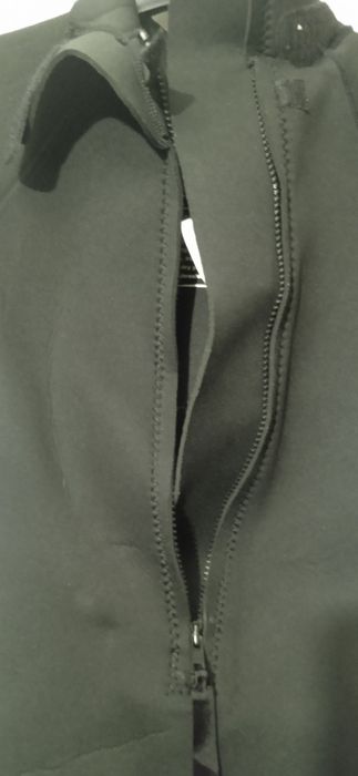 продам гидрокостюм Trespass, Olaian