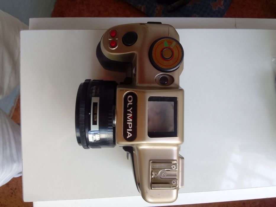 Máquina fotográfica olympia antiga