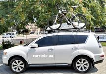Thule прокат оренда багажник на дах авто Terra Drive бокс велокріплень