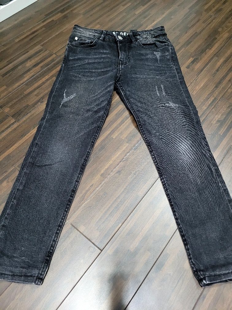 H&M jeansy czarne ocieplane rozm. 134
