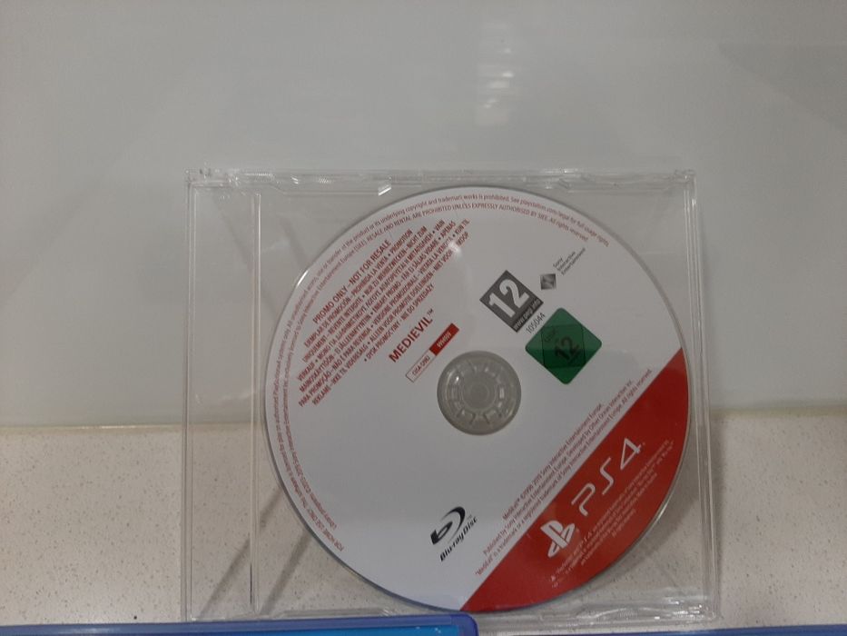 PlayStation 4 + 1 Comando + Jogos