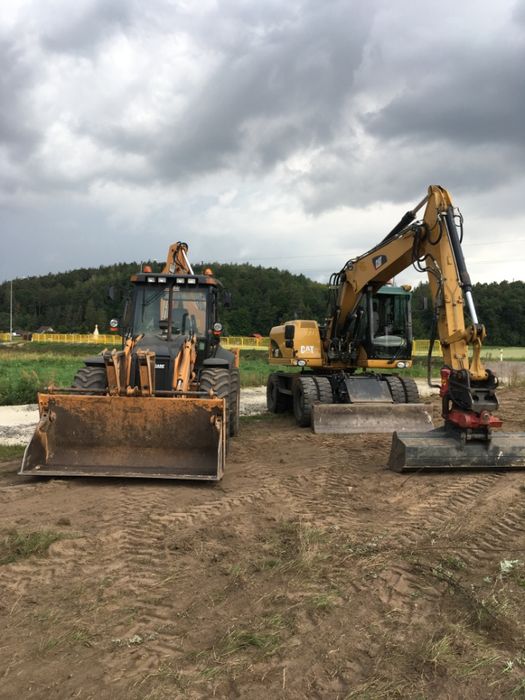 roboty ziemne koparka koparko-ładowarką wywrotka wykopy wyburzenia