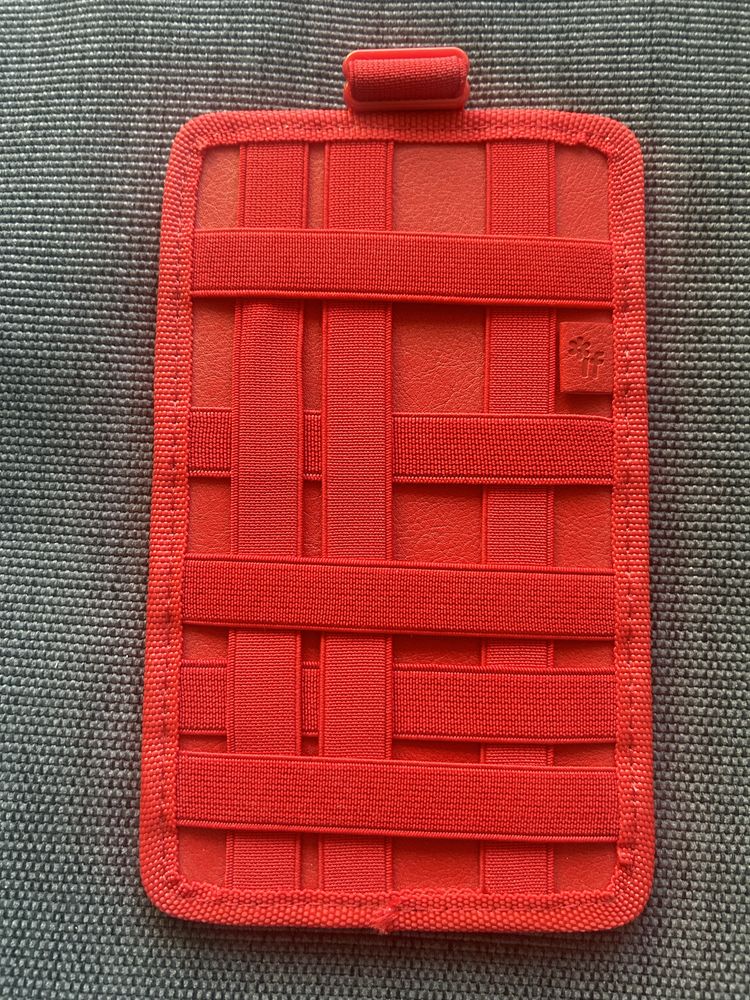 Dodatek/holder na notes