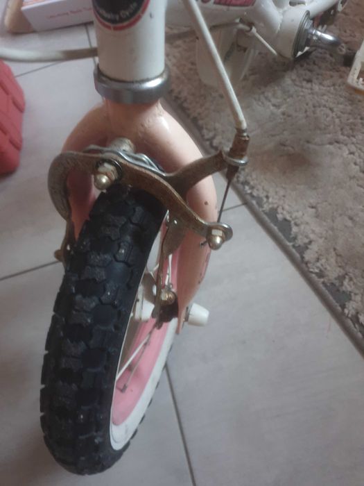 Rower dla dziewczynki z koszykiem i kółkami bocznymi  12 cali