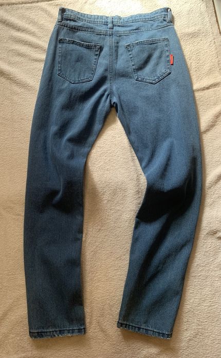 Джинси синього кольору