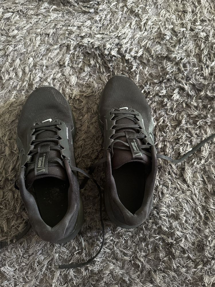 Sapatos pretos da nike