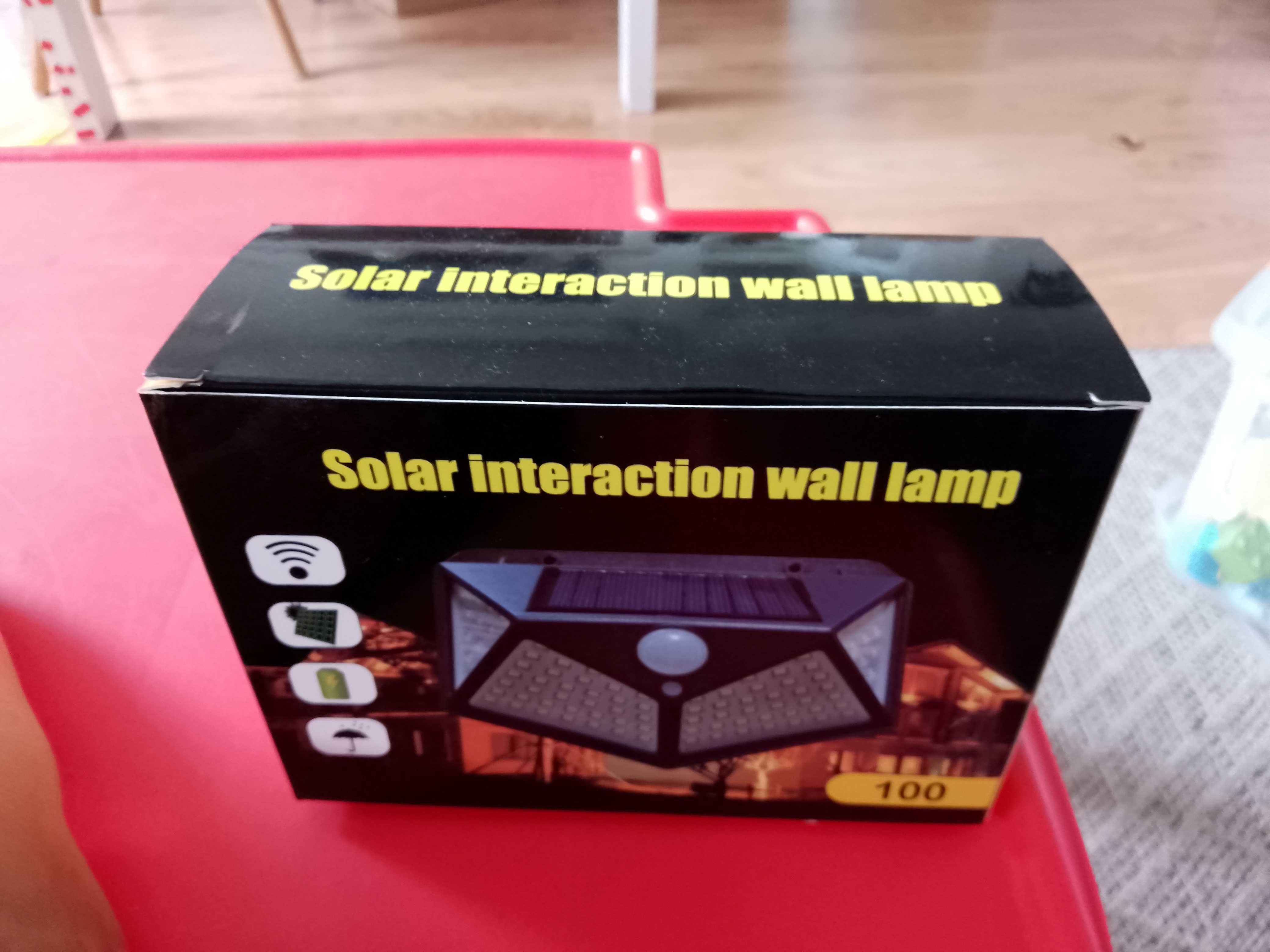 LAMPA SOLARNA 100 LED Z CZUJNIKIEM zmierzchu ruchu elewacyjna ogrodowa
