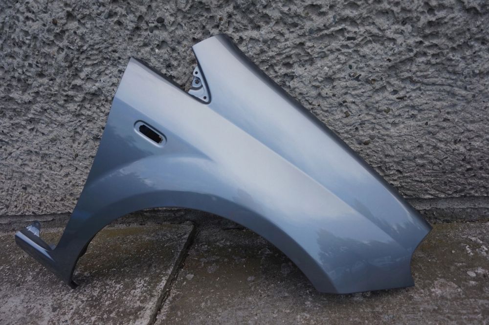 BŁOTNIK PRZEDNI PRAWY FIAT GRANDE PUNTO 595/A