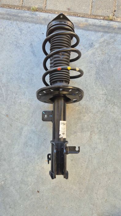 Peugeot 208 MCpherson lewy przód 2024r