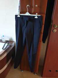 Spodnie czarne długie rozmiar 42 60% bawełna 37% nylon 3% elastan