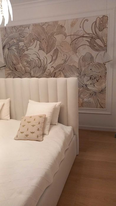 Sypialnia łóżko tapicerowane półwałki panele stelaż pojemnik welur