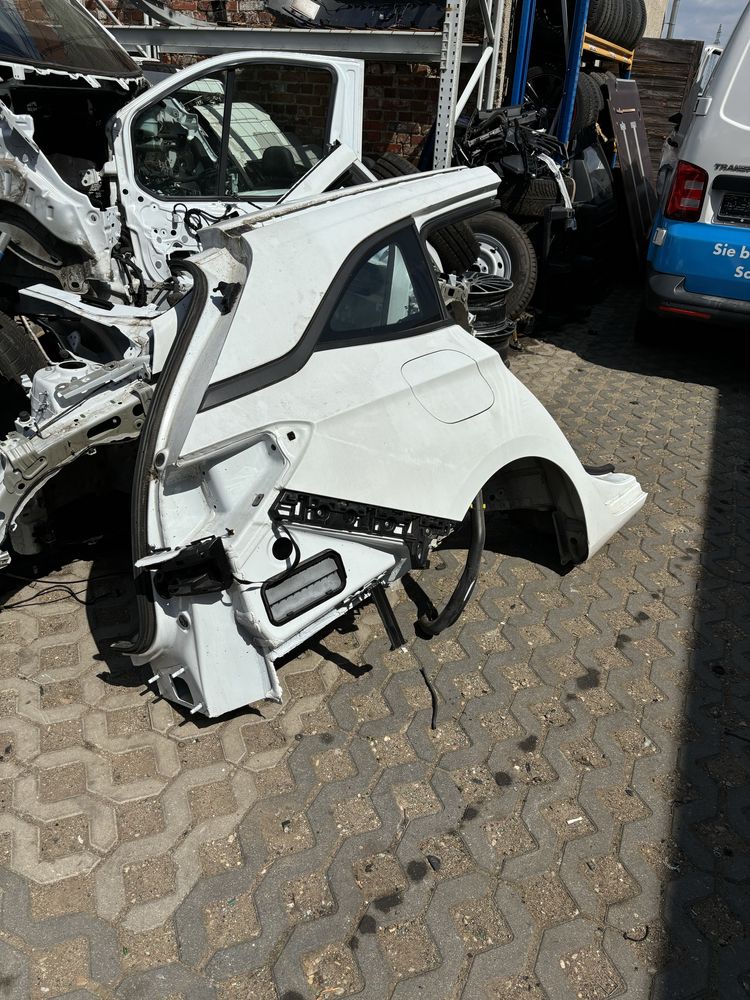 Opel Astra K kombi błotnik prawy tył y 40r