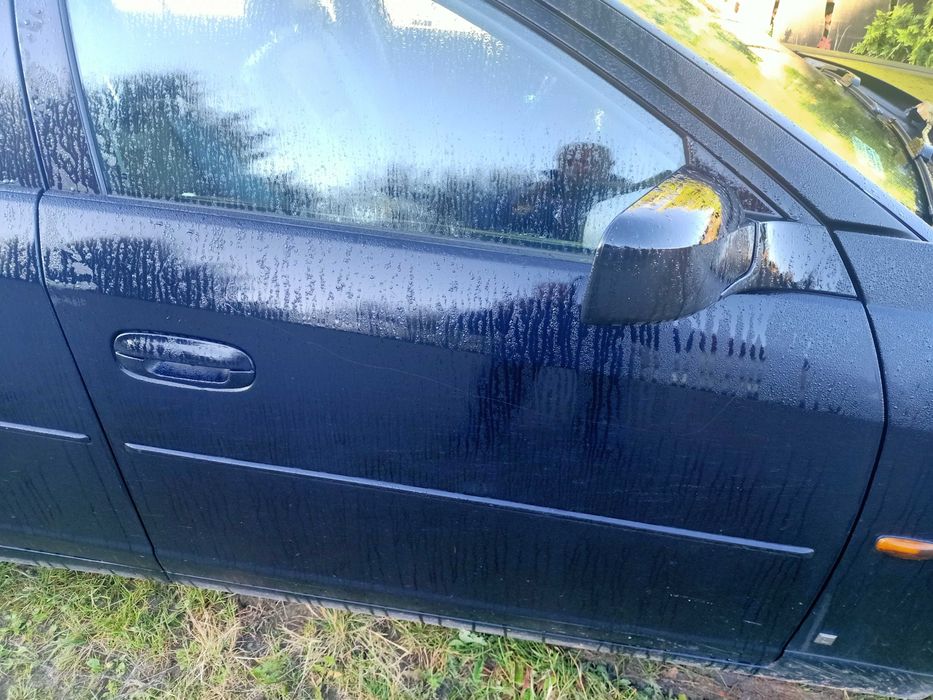 sprzedam drzwi prawe i lewe tył i przód kompletne  do Cadillac1 - CTS