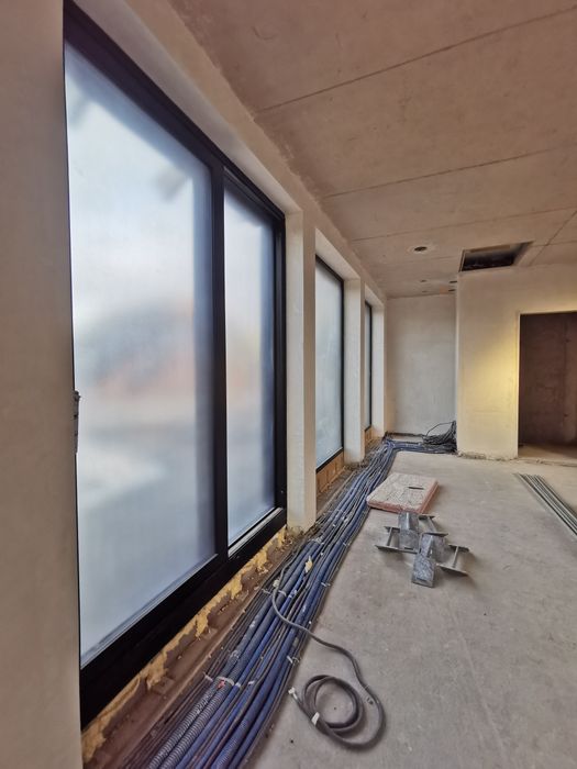 Solidne tynki i wylewki maszynowe/Ocieplanie pianą poliuretanową