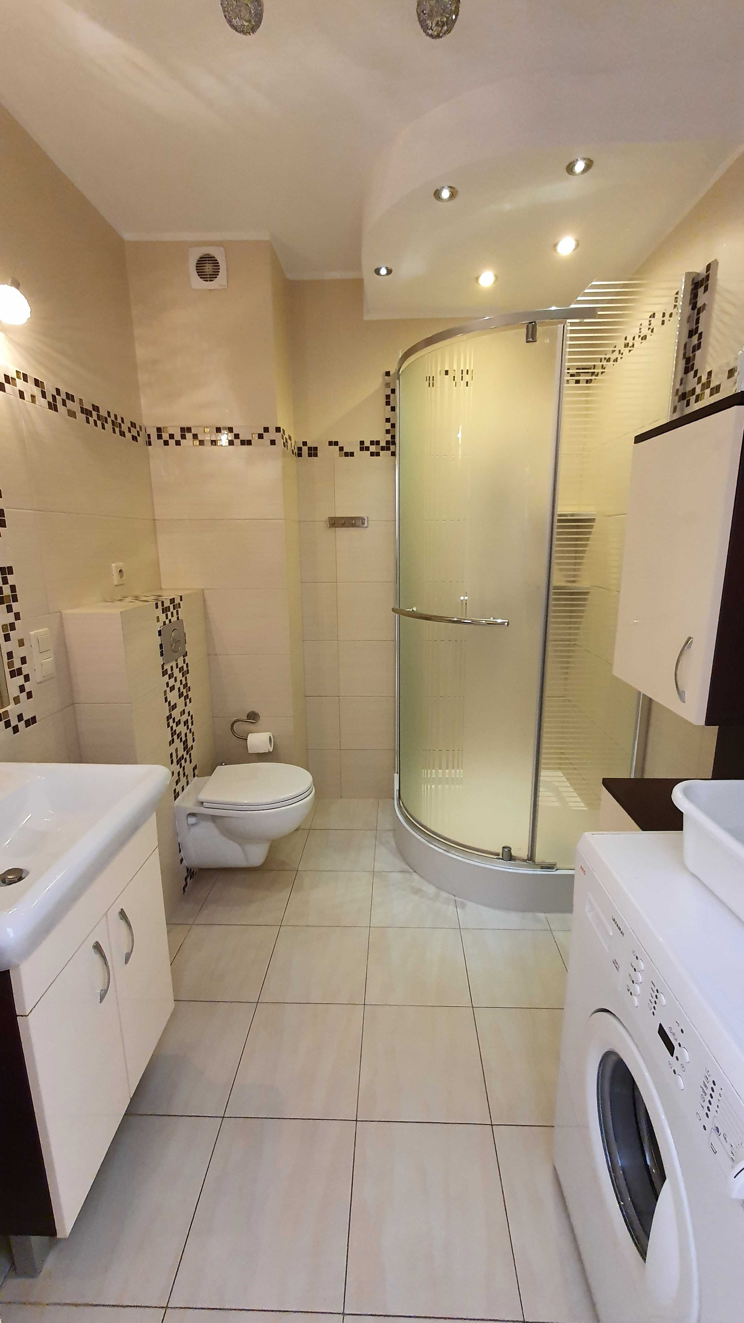 APARTAMENT NAD MORZEM 2-po. z ogrodem i parkingiem.