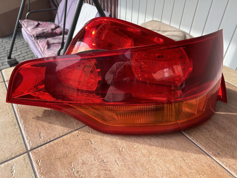 Audi Q7 4L lampy tył tylnie OE komplet stan bdb