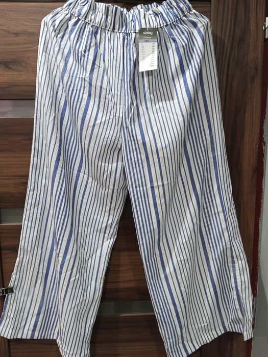 Nowe spodnie dziewczęce rozm 164