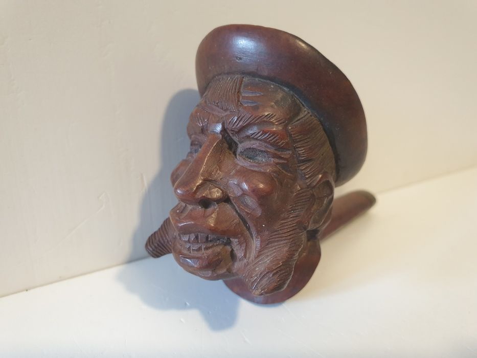 Antiga cabeça de um cachimbo americano -Farmers head