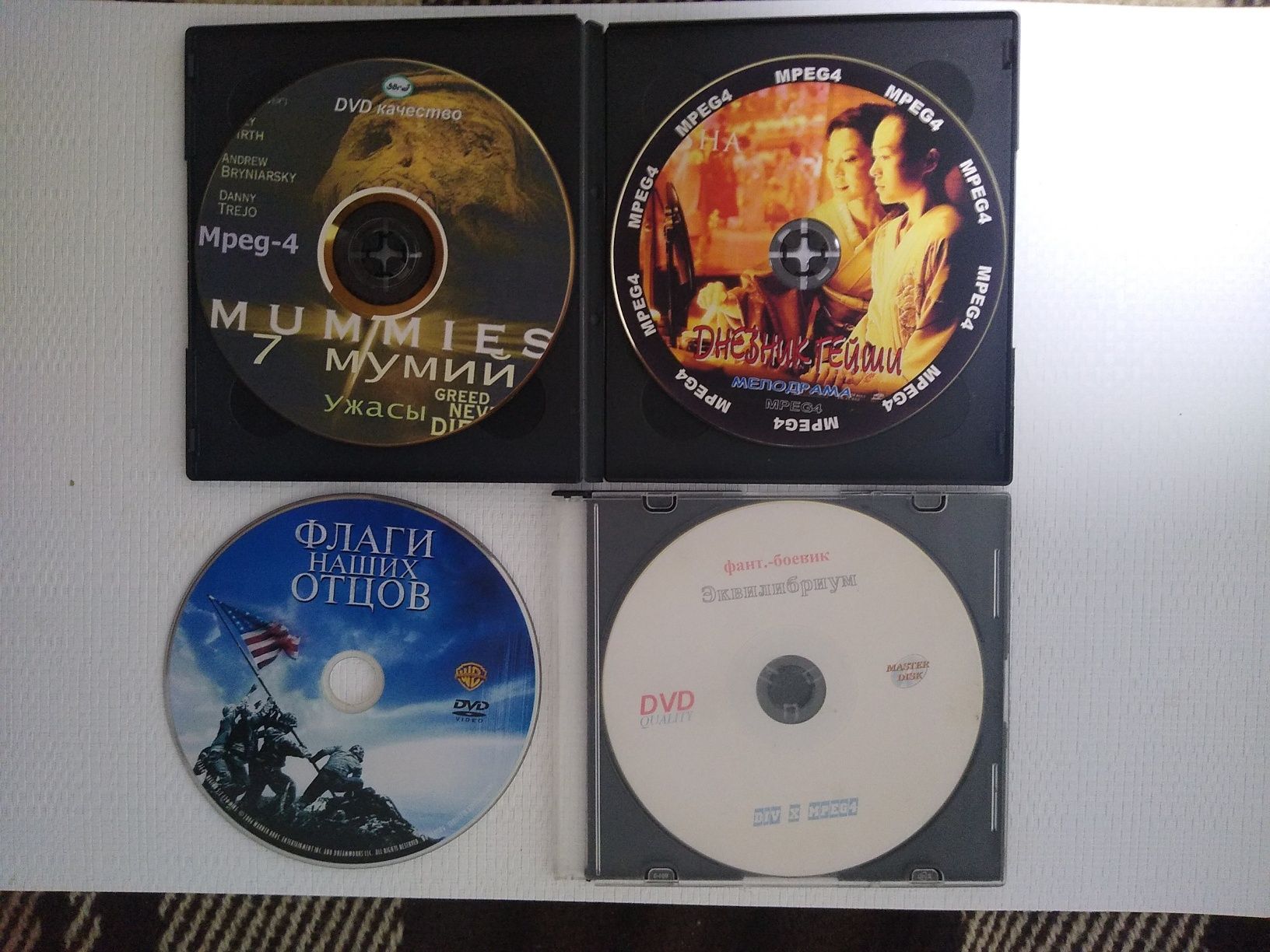 фильмы на CD на 5 фотографиях