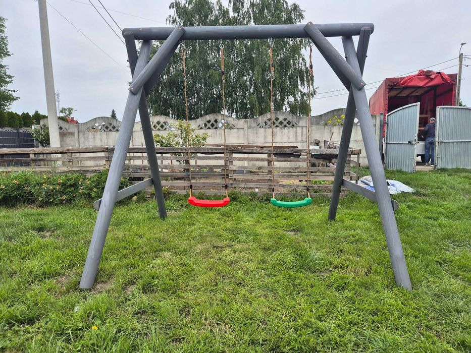 Huśtawka ogrodowa drewniana "BARTEK" z grubego bala  Producent