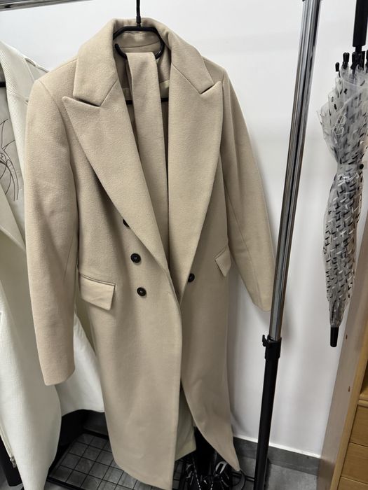 Жіноче пальто міді