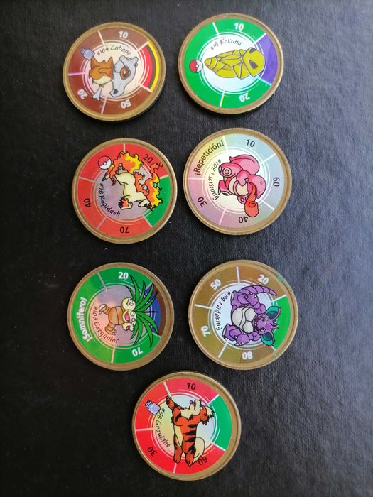 Lote 7 Tazos POKÉMON Nintendo Preço para Desocupação espaço