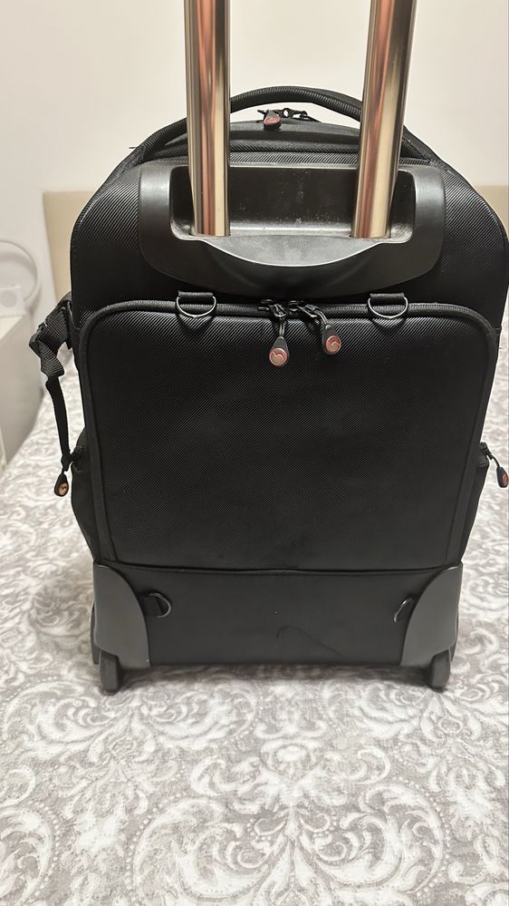Mochila trolei equipamento foto