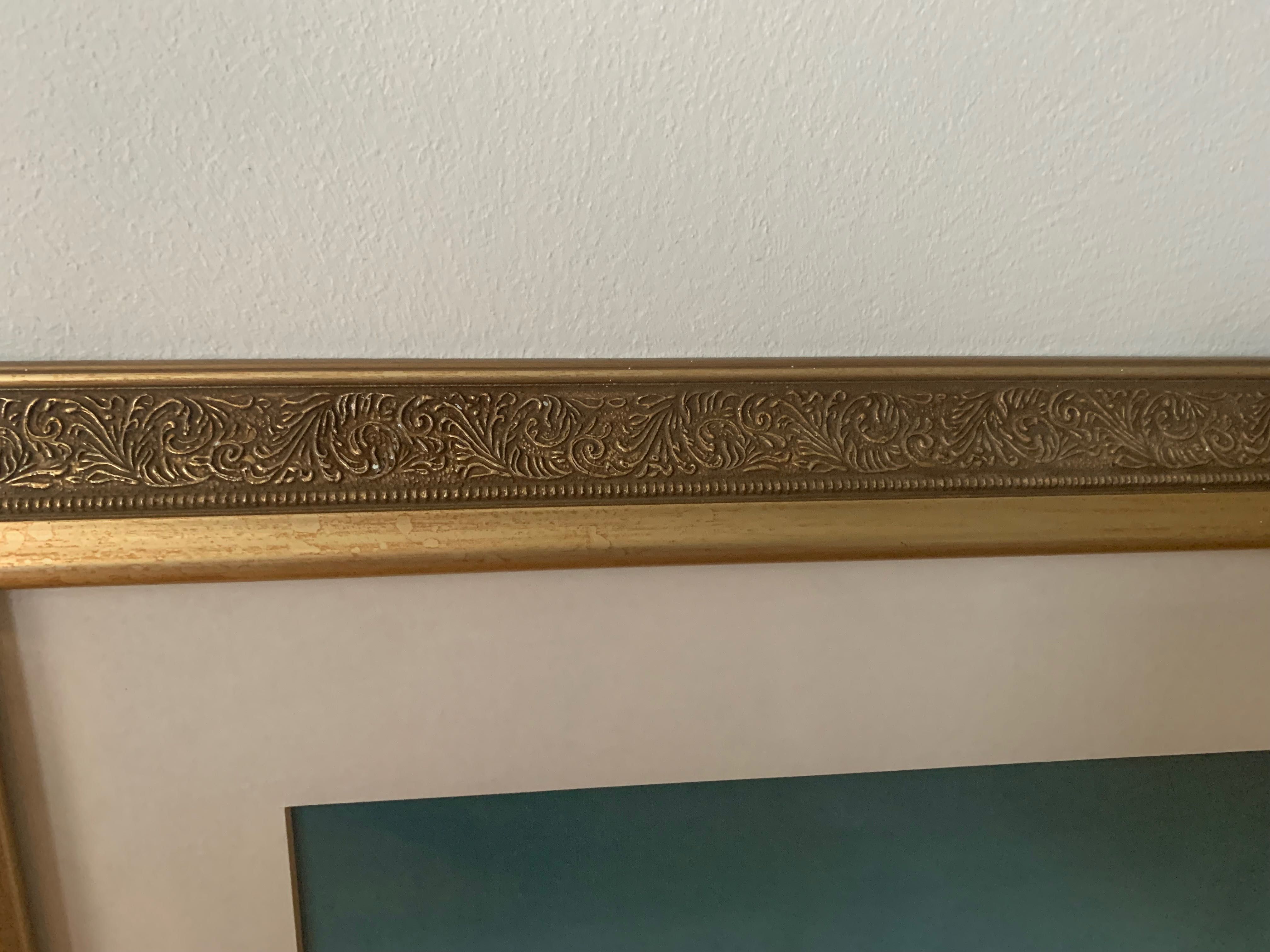 Zdobiona ornamentowa rama  o wymiarach 52x62 cm w kolorze złotym