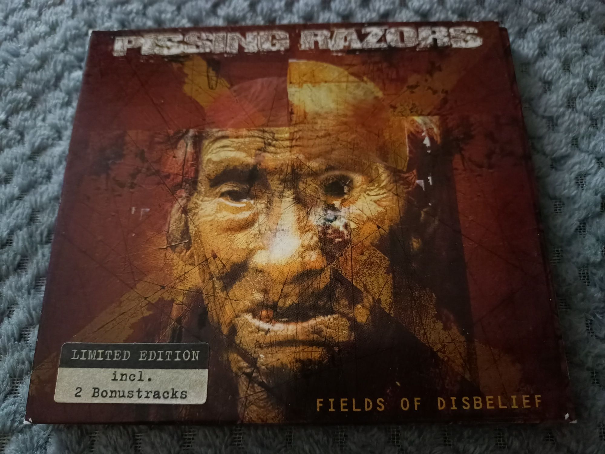 Pissing Razors - Fields Of Disbelief (CD, Album, Ltd)(ex)