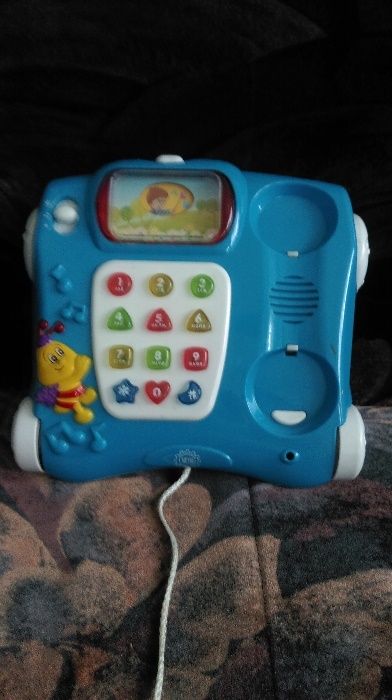 Музыкальная игрушка машина телефон.