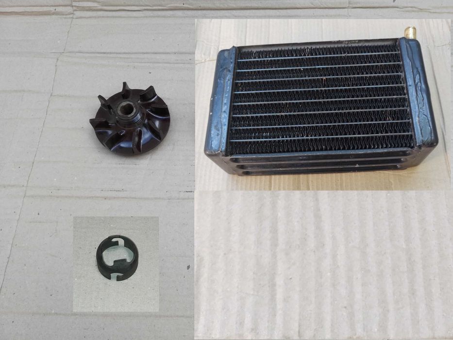 Радиатор печки, крыльчатка помпы, фиксатор рычага КПП