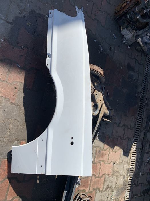 Błotnik lewy Polonez Caro