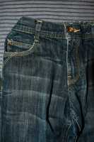 Spodnie jeansowe dla chłopca 140