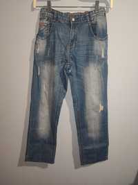 Spodnie jeansy dla chłopca z przetarciami 152