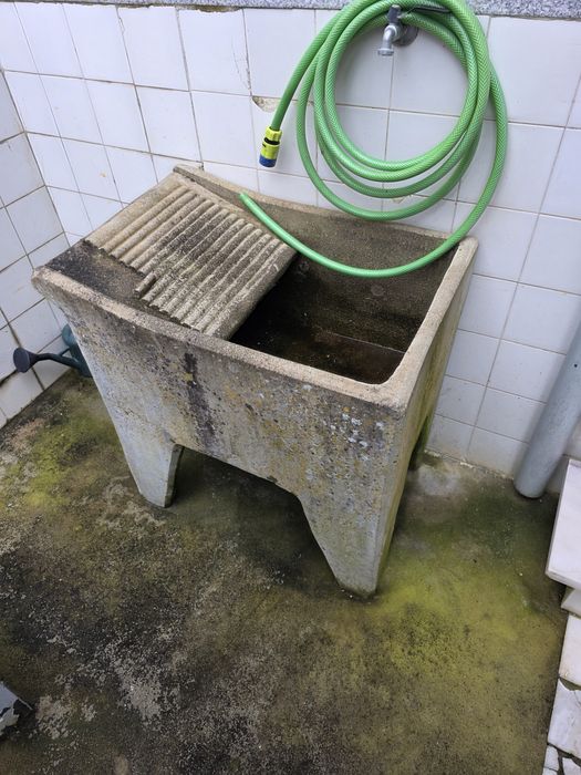 Taque de cimento para lavar roupa